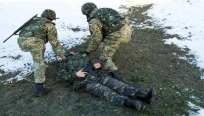 Відтягування поранених